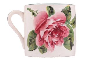 A Wemyss pottery mug, early 20th century, decorated with cabbage roses, painted and impressed marks,