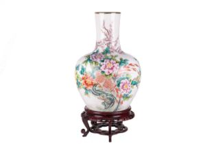 A large 18th-century style Chinese porcelain famille rose heavy baluster vase, 20th-century, with
