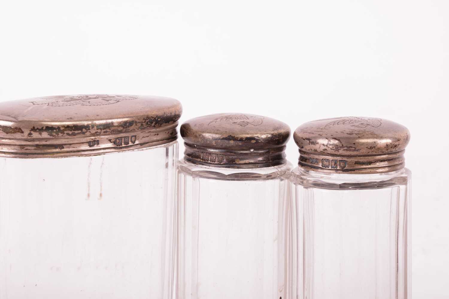 A mixed collection of silver and plate comprising a silver mug, two silver cigarette cases, a silver - Image 3 of 4