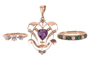 An Edwardian pendant and two gem-set rings; the openwork pendant set with a heart-cut amethyst and