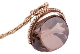 A swivel smokey quartz fob pendant, a smokey quartz brooch and a beaded necklace The faceted smokey 