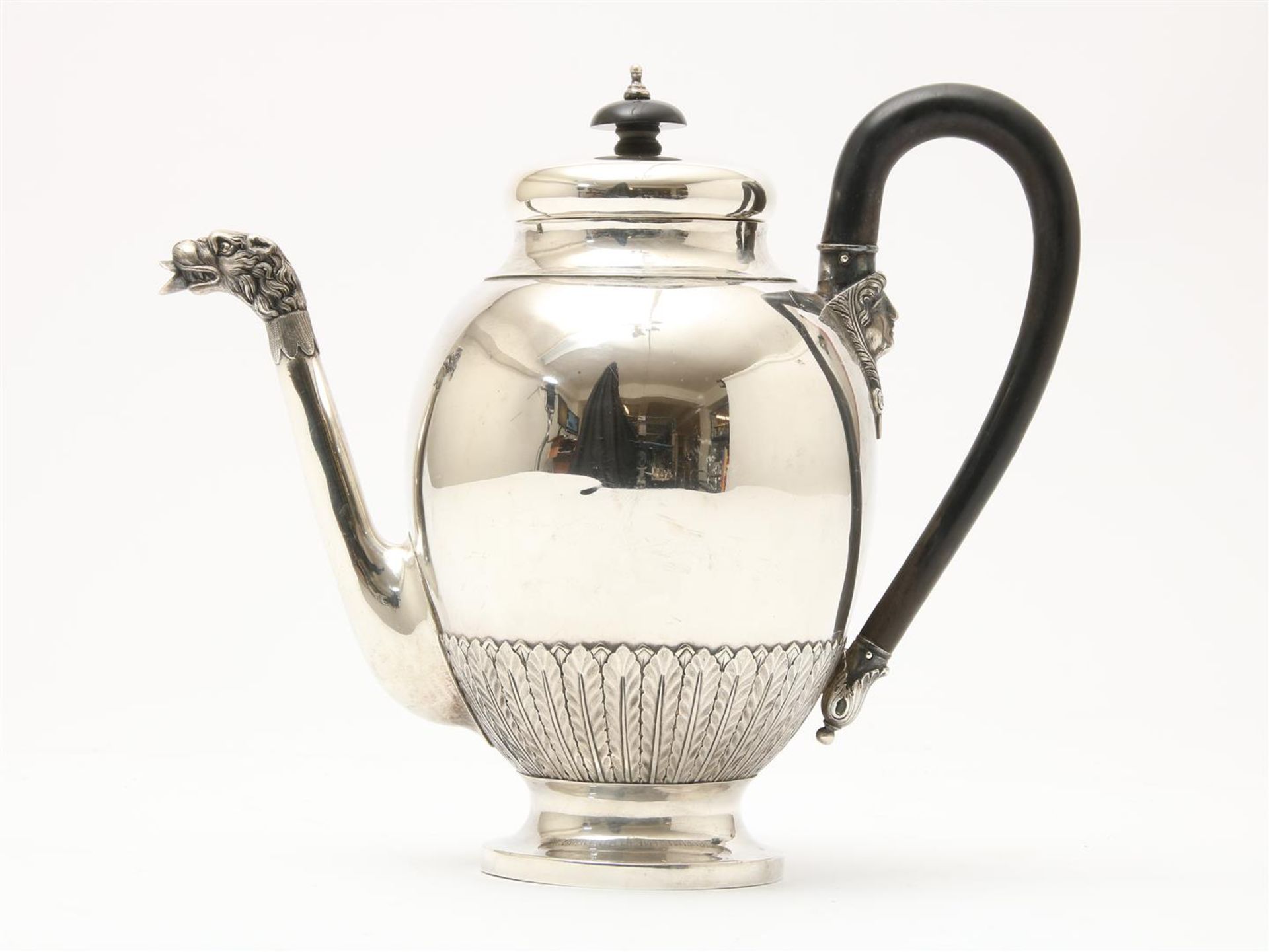 Silver Empire coffee pot, hammered with ribbed edge, spout with lion's head and mascerons on