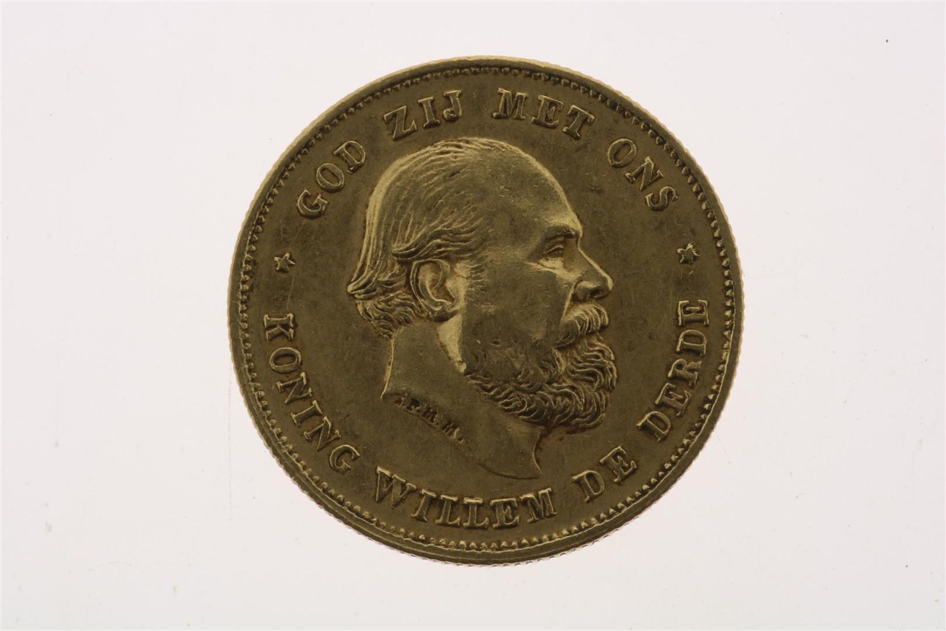 Gold tenner with image of Willem III, looking to the right, 1875, weight 6.72 grams.