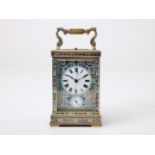 Gilt brass travel clock with enamel dial with Roman numerals, alarm clock with Arabic numerals,