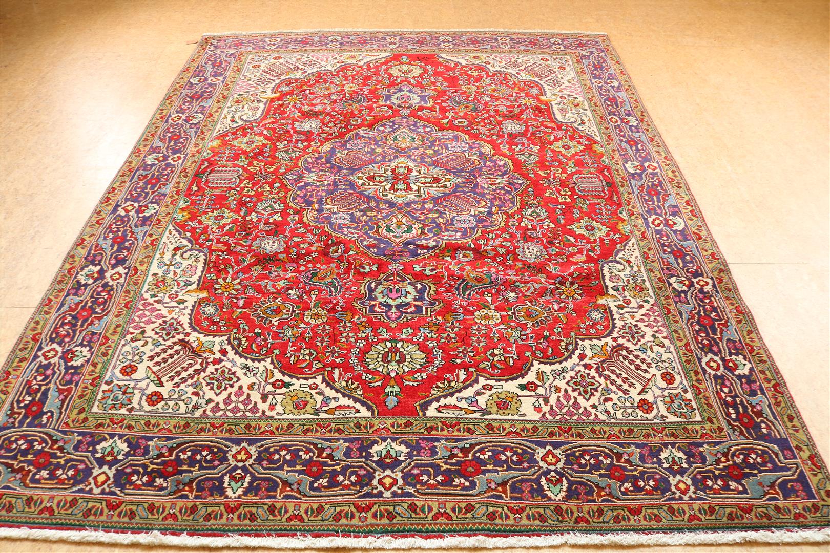 Rug, Tabriz, 330 x 250 cm.