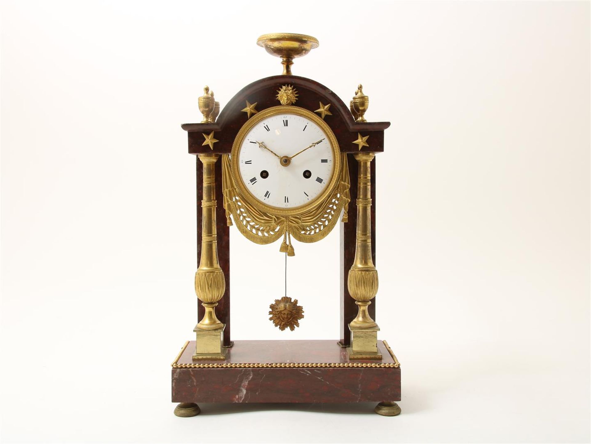 Red marble -Griotte marble- Empire portal mantel clock (Pendule portique) with ormolu ornaments,