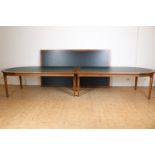 Oak conference table with black leather inlaid top on tapered legs, 78 x 440 x 136 cm. here is a
