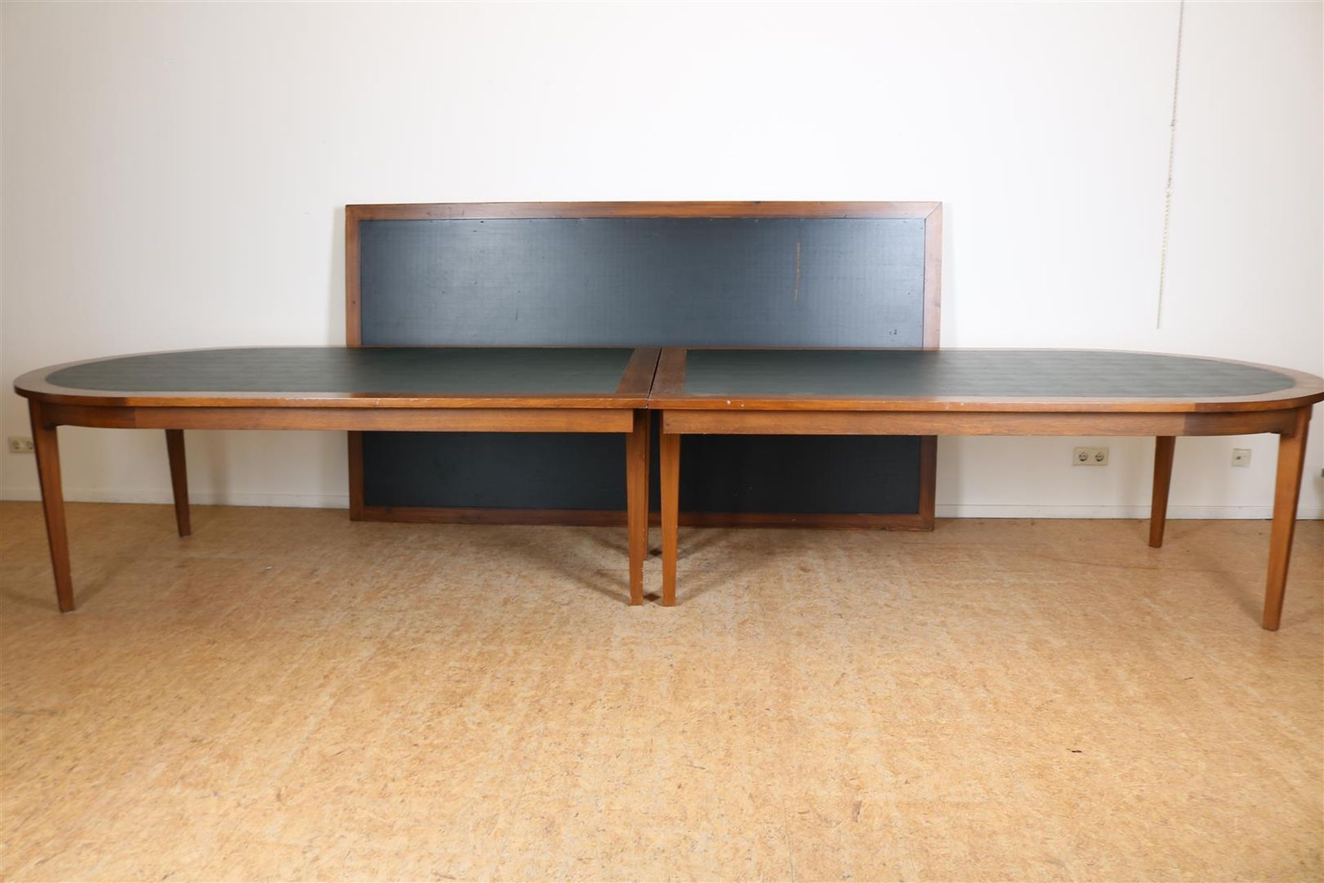 Oak conference table with black leather inlaid top on tapered legs, 78 x 440 x 136 cm. here is a