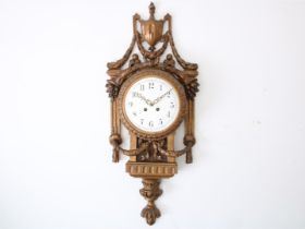 Louis XVI style cartel clock