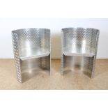 a pair of aluminium chairs