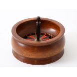 Turned miniature mahogany roulette, with 4 balls, 19th century, height: 10.5 cm.