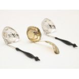 Lot of silver spoons consisting of 2 openwork spreading spoons with ebony handles, France 19th