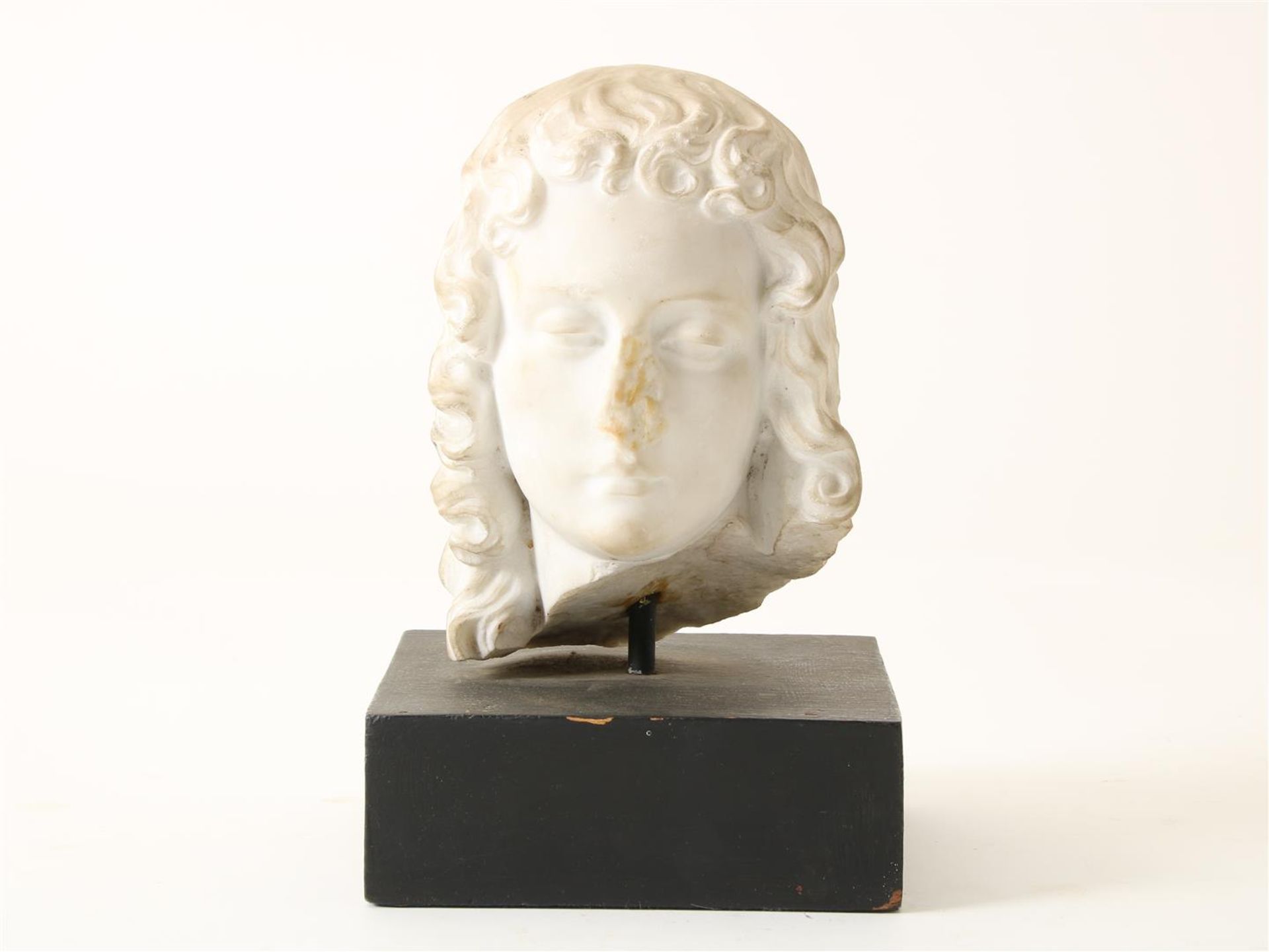 Marble bust of goddess, mounted on wooden base, height 25 cm.