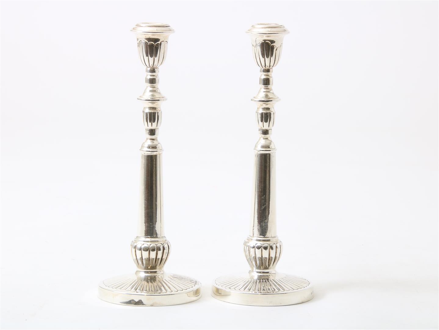 Set of silver one-light candlesticks, grade 900/000, height 26 cm, gross weight 540 grams. (