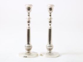 Set of silver one-light candlesticks