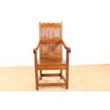 Oak baking chair with wooden panel backrest on block legs connected by rules, 18th century.