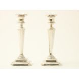 Set of silver one-light candlesticks, on square base, England, 925/000, Sheffield, year letter: "p":