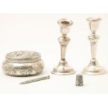 Lot of silverware including lidded box, 2 candlesticks (defective) and thimble, pencil holder (