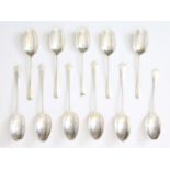 Lot with 11 silver spoons, with rat tail partly with monogram, England 18th century, gross weight