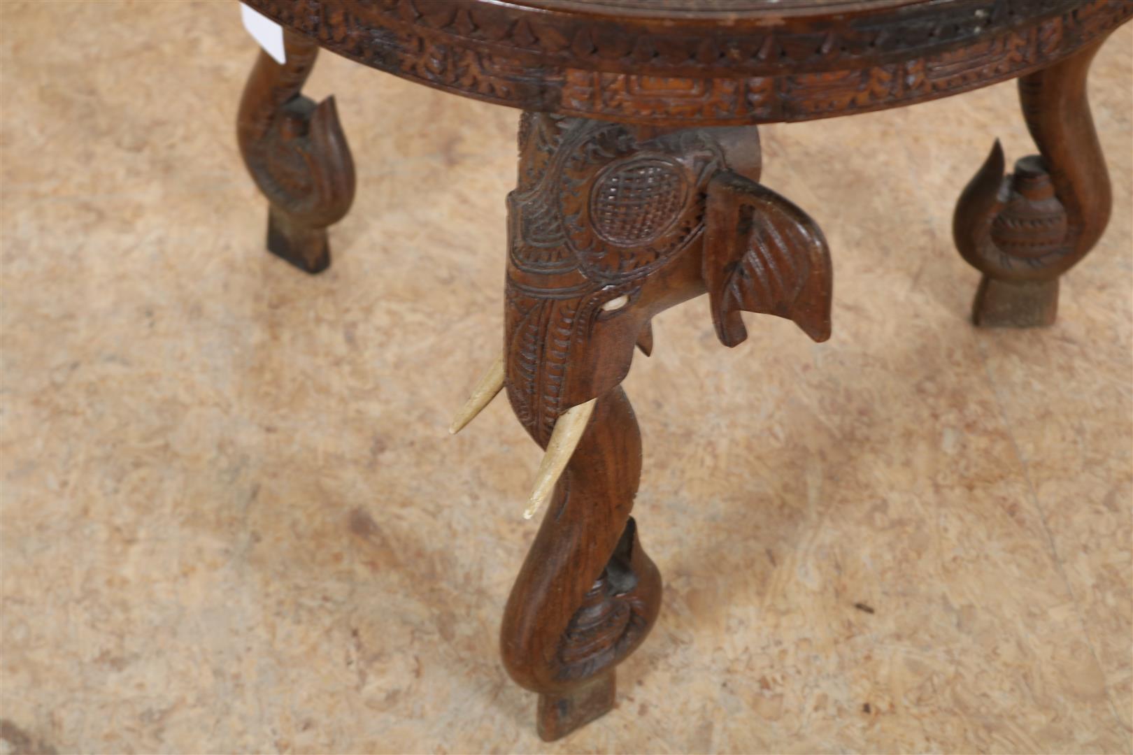 Teak elephant table with bone tusks and floral relief top, India, 39 x 46 cm. - Image 3 of 3