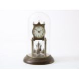 Brass year mantel clock with enamel dial, so-called 400 day clock under glass bell jar, circa