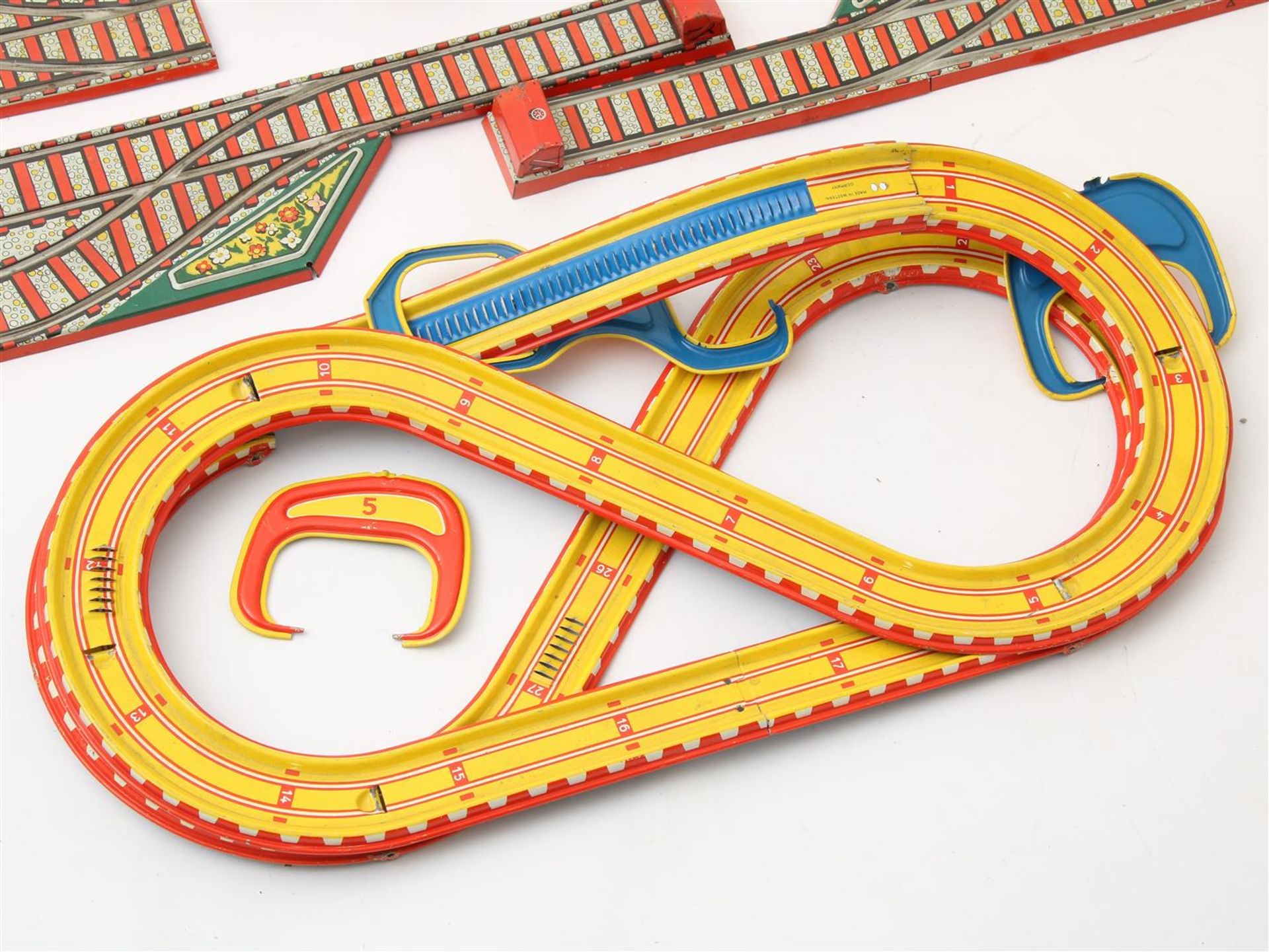Lot of a tin Toboggan roller-coaster with 3 wagons, marked Technofix, Germany 1960-1969, a tin train - Image 2 of 3