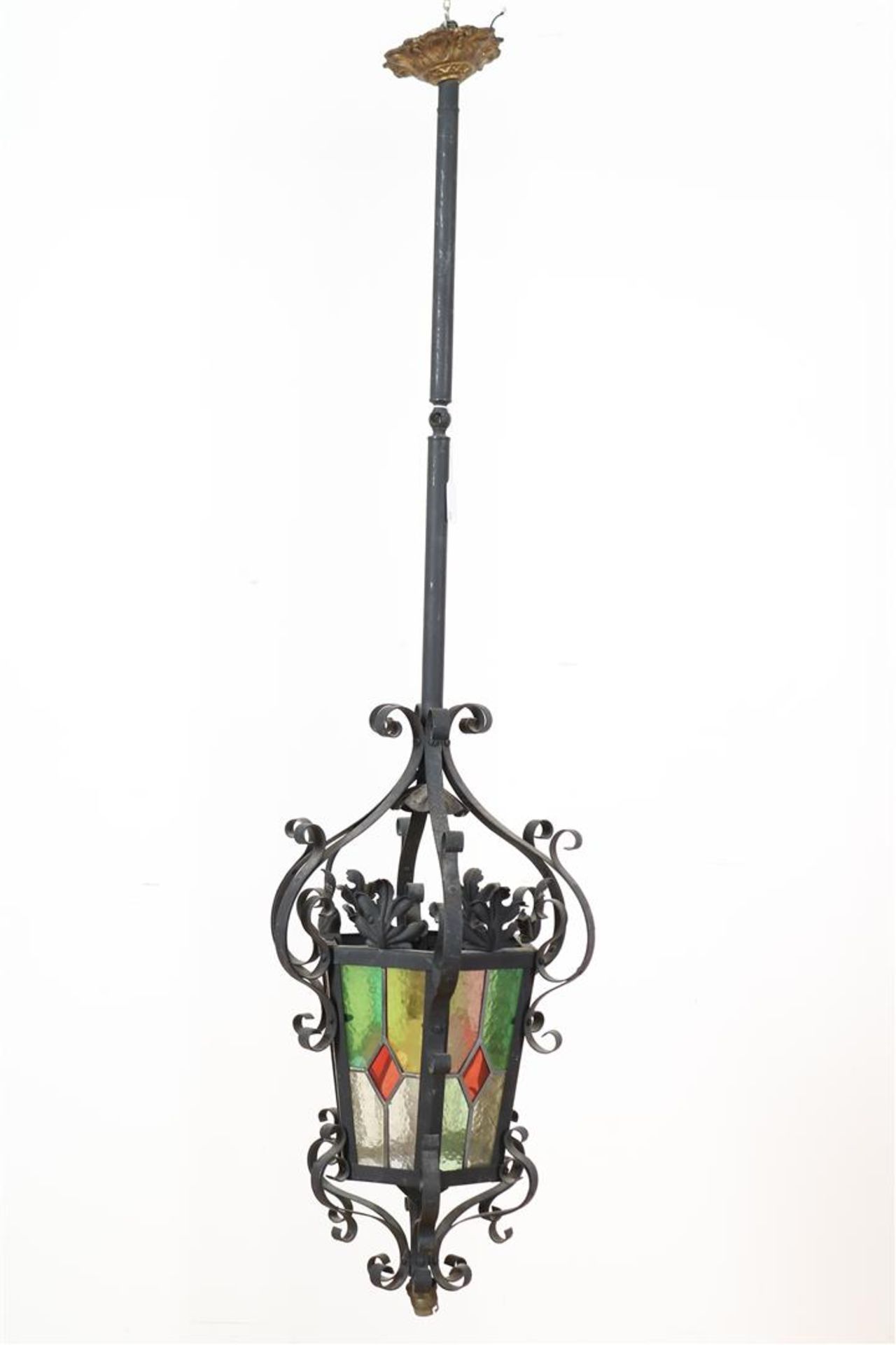 Wrought iron lamp with colored stained glass windows, aprox 1920, height 124 cm.