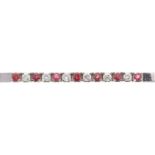 White gold matted bracelet set with rubies and diamonds approx. 1.2 crt. measured when set,