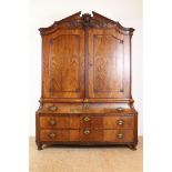 Mahogany Louis XVI breakfront cabinet with carved garlands in crest, 2 panel doors and 3 drawers,