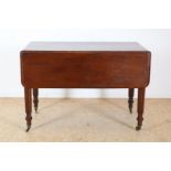 Mahogany George III drop-ear table with cutlery drawer on turned legs and brass wheels, England 19th