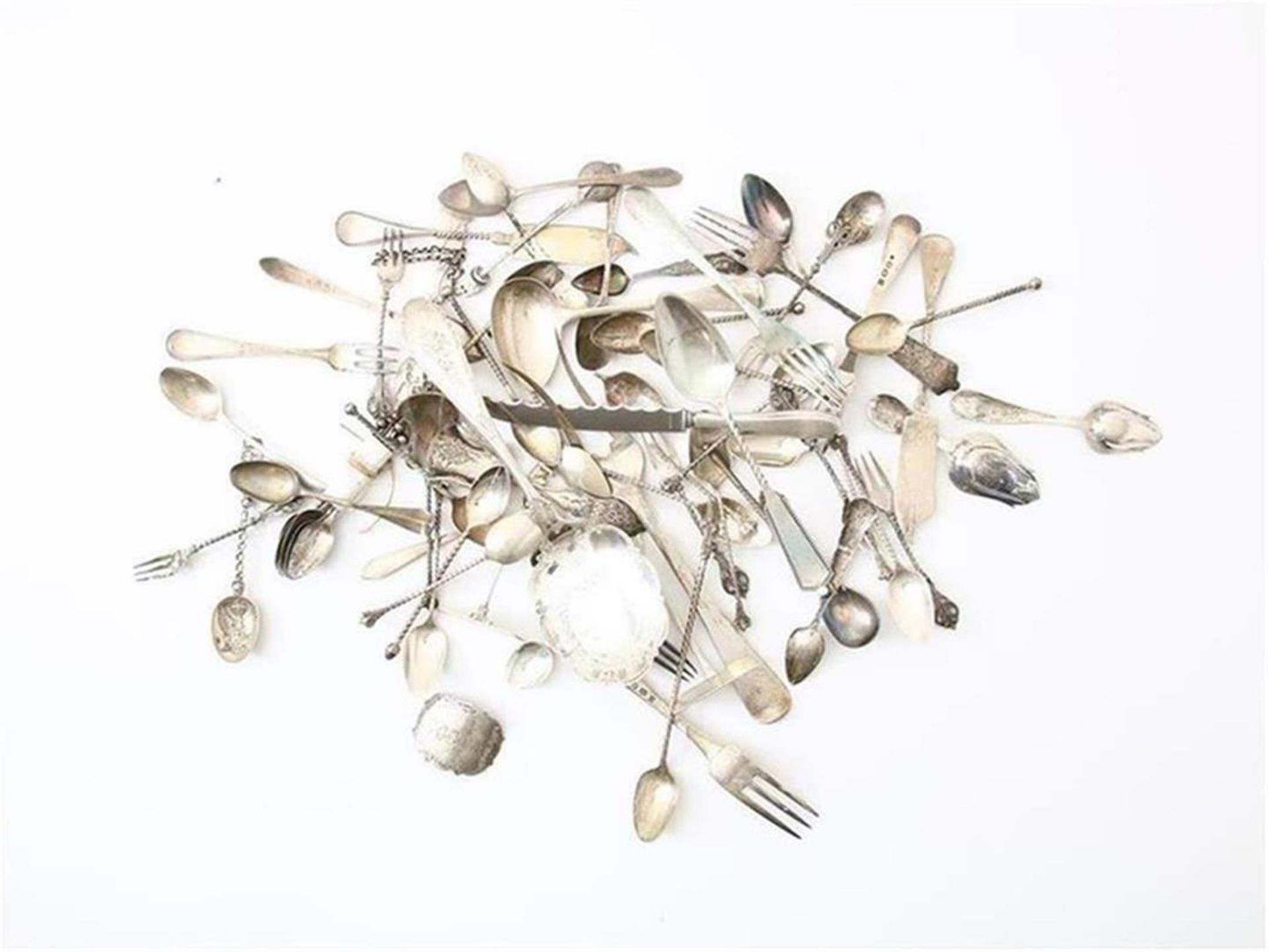 various silver: serving spoon, meat fork Haags lofje, food slider, various spoons, forks etc.