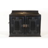 Blackened pine (table) art cabinet, the top with a raised lid with a mirror behind it, underneath