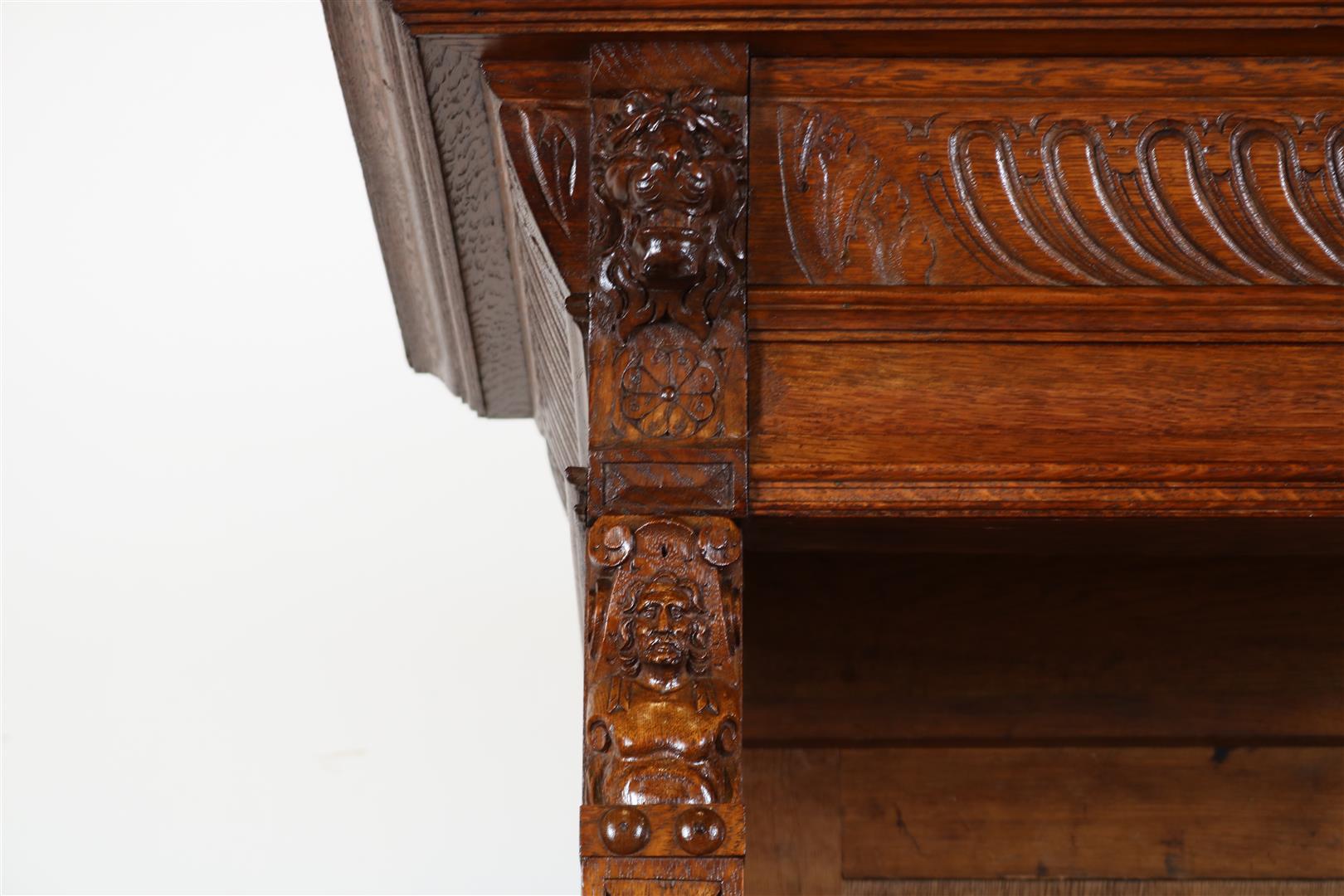Oak Renaissance style open bookcase with carved "grunts" in the hood and carved lion masks and - Image 4 of 5