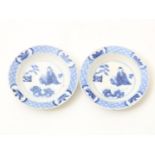 Set of blue porcelain saucers decorated with Chinese philosopher and napkin work, China Kangxi,
