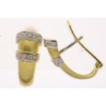 Yellow gold earrings set with diamonds, brilliant cut, approximately 0.15 ct., F/G, VS/SI, grade