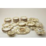 80 pieces of earthenware tableware with floral decorations, marked Alfred Meakin England, model