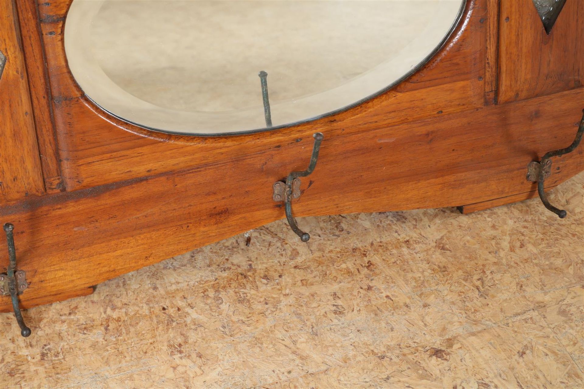 Teak Art Deco wall coat rack with oval cut mirror, Indonesia ca. 1925, 53 x 75 cm. - Image 3 of 3