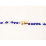 Lapis with freshwater pearl set with gold ball clasp l.18 and 38 cm.