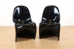 Set of black fiberglass design chairs, by Herman Miller
