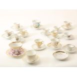 Lot of 15 porcelain commemorative cups and saucers with gold paint and floral decorations, including