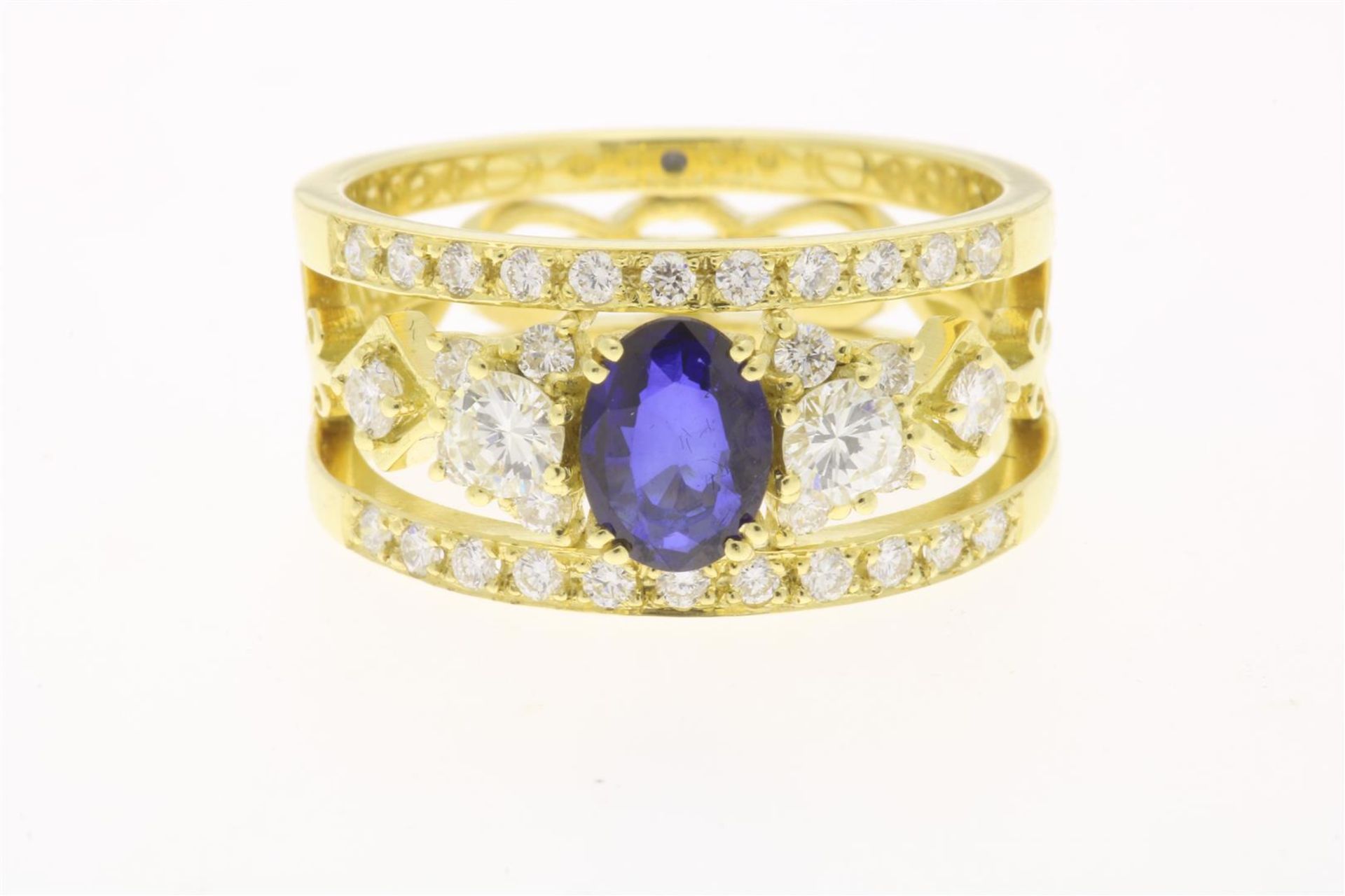 Yellow gold band ring with sapphire and diamond
