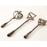 Three antique wrought iron branding irons, with initials FN, LA, and 25 (?). (Missing their short