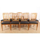 Series of 9 oak chairs with openwork backrest and black fabric seat, including 1 armchair.