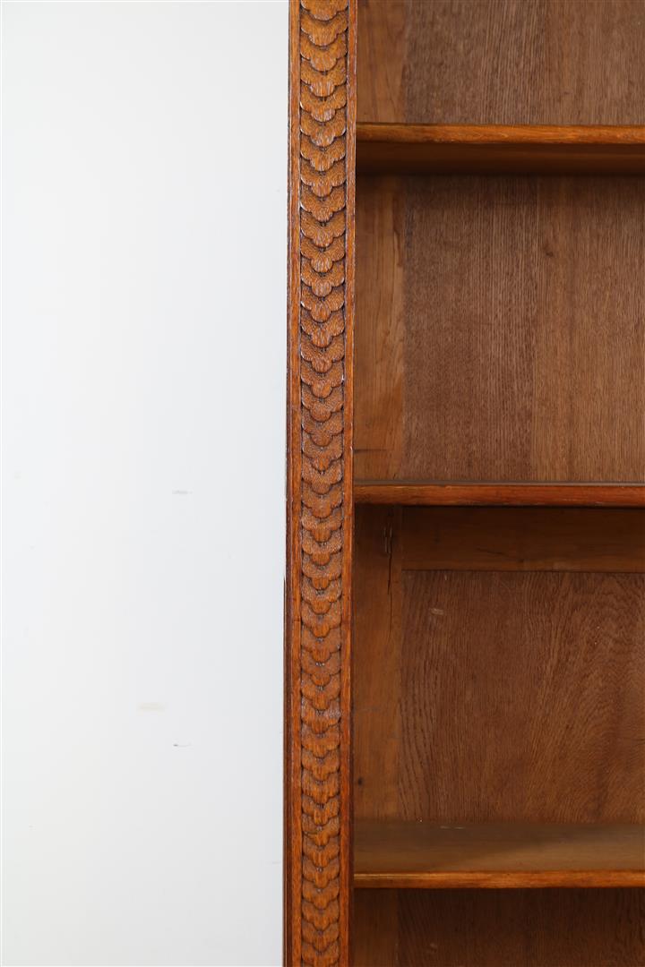 Oak Renaissance style open bookcase with carved "grunts" in the hood and carved lion masks and - Image 2 of 5