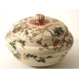 Porcelain Satsuma lidded box with decor of figures in landscape on lid and blossom branches on
