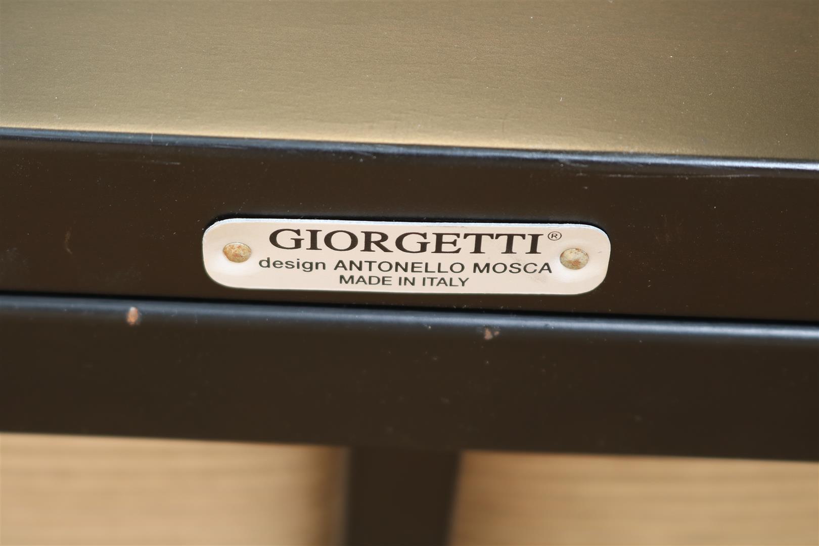 Designer armchair and stool with woodwork in dark brown stained beech on a black metal base, - Image 7 of 7