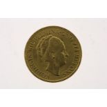 Gold tenner with image of Wilhelmina with updo hair, in an ermine cloak, looking to the right, 1932,