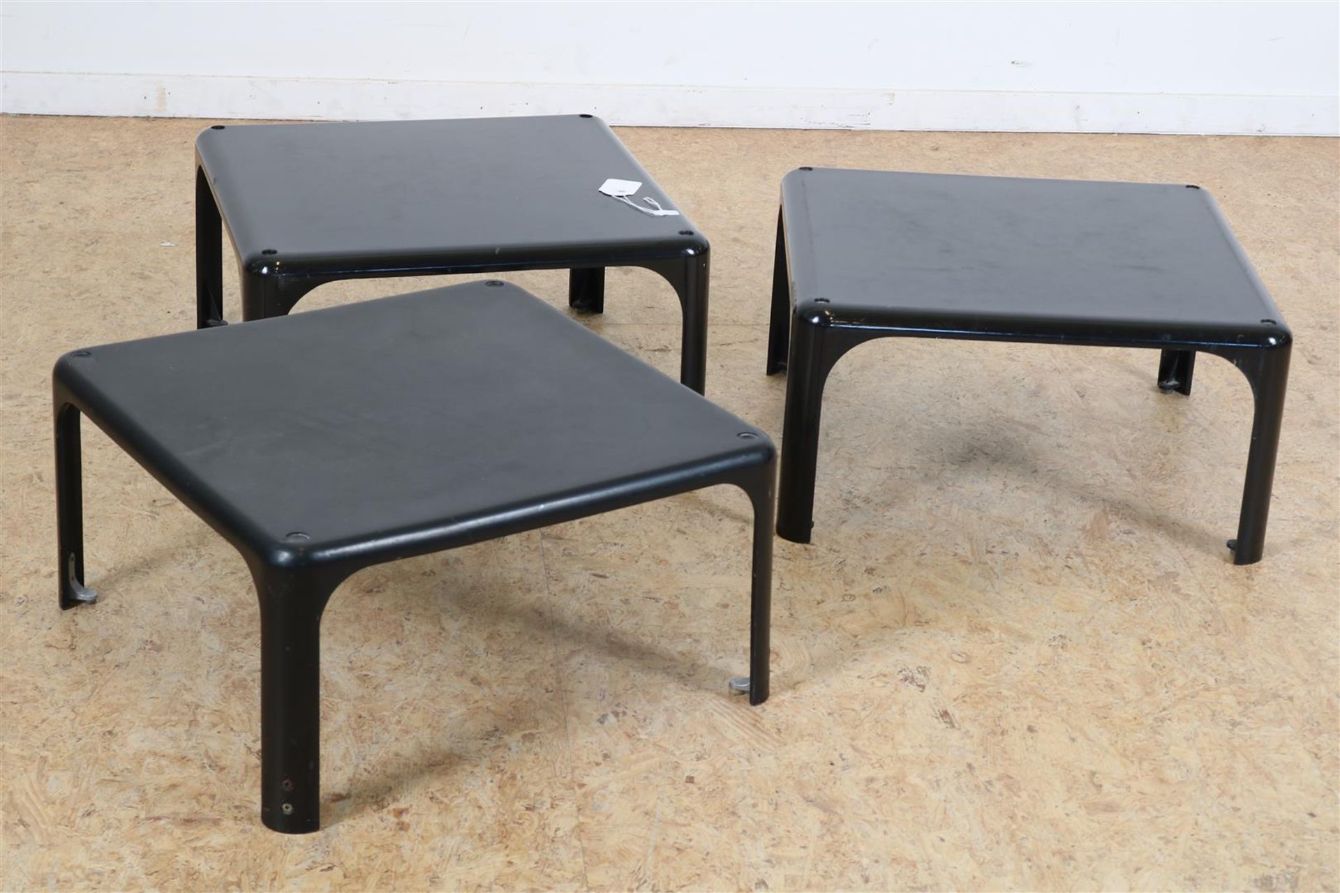 Series of 3 black plastic stackable design side tables, designer Vico Magistretti for Artemide,