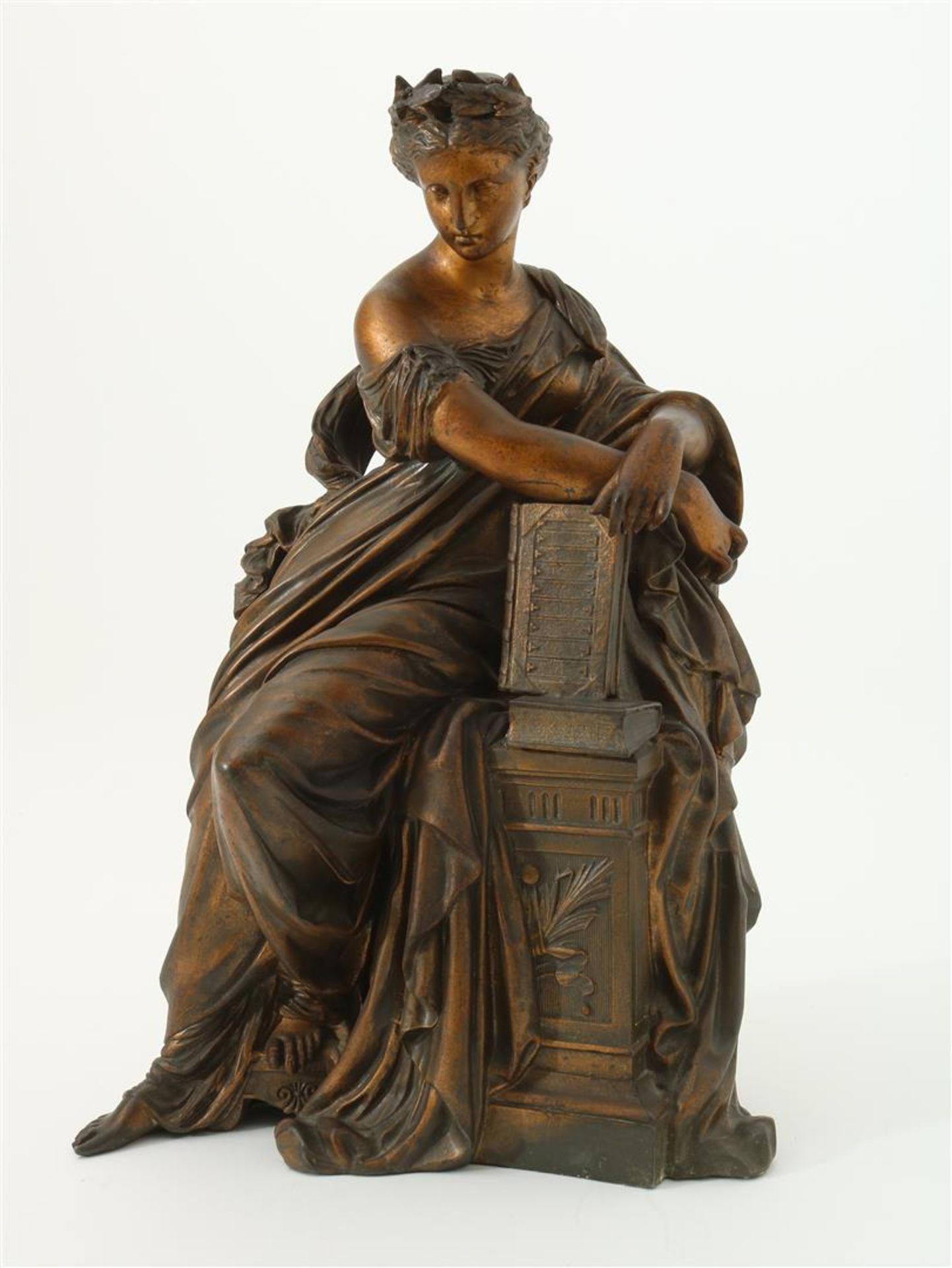 Zamak sculpture of a seated lady on a pillar leaning on a book, France, ca. 1880/90, height 41 cm.