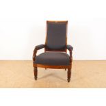 Mahogany armchair with carved swans, covered with ribbed fabric,